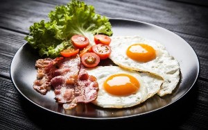 Two fried eggs and bacon
